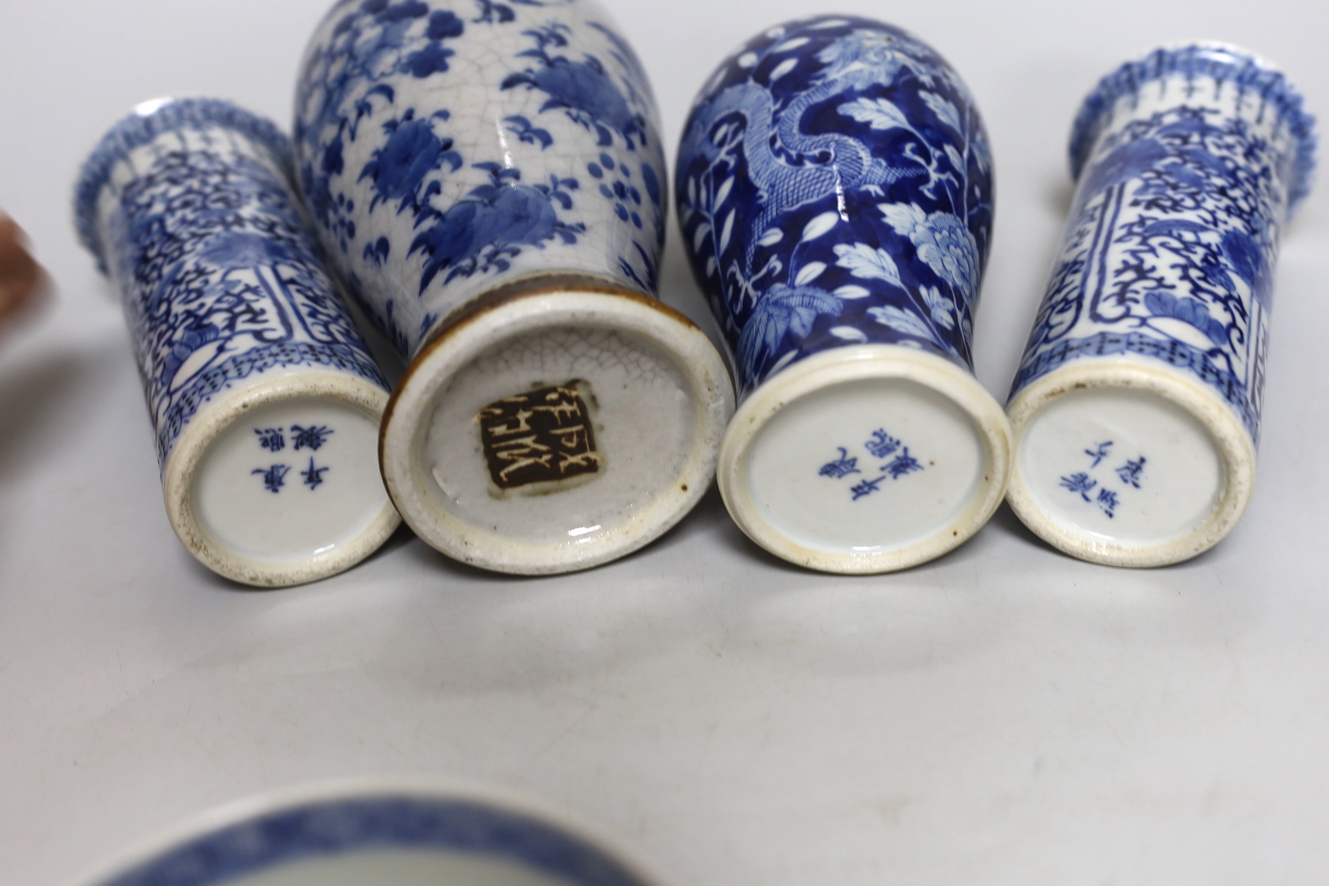 A pair of Chinese blue and white sleeve vases, a crackle ware vase, a dragon vase and a bowl, crackleware vase, 22cm high